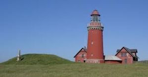 Bovbjerg Fyr og fyrmesterens huse. Foto: Bovbjerg Fyr Foto af Bovbjerg fyr med fyrmesterens huse ved sin side